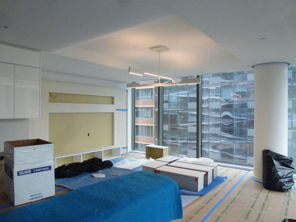 Work in progress built in bookshelf on a brick wall